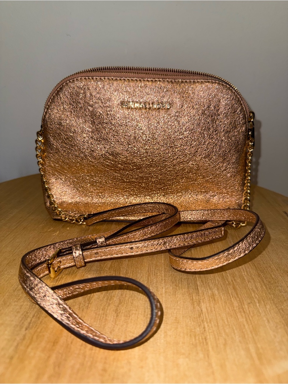 Michael Kors Metallic Rose Gold Dome Crossbody